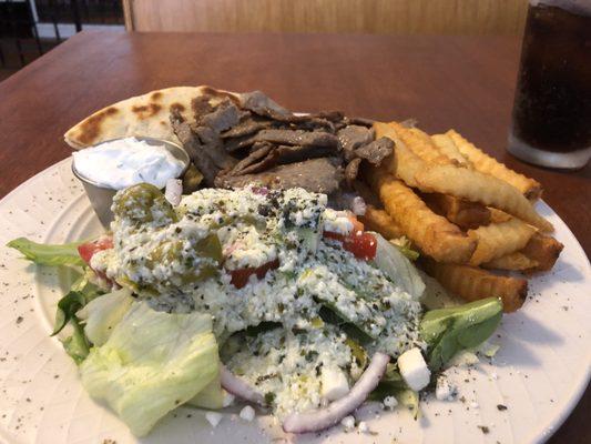 Gyro plate with fries and Greek salad.