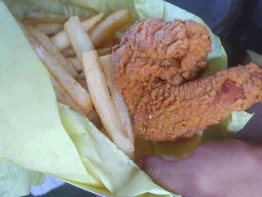 Fried chicken wing and fries