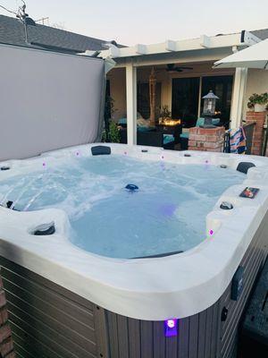 Beautiful spa 96 jets with waterfall feature, wifi, Bluetooth, radio, speakers, cover and steps. It has it all!