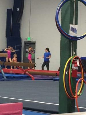 Class practicing with their coach at Gymnastics Connection.