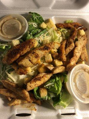 Grilled chicken Caesar salad from Bayou crawfish in Many Louisiana