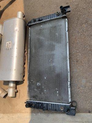 Broken radiator on a 2003 Chevrolet 2500HD.