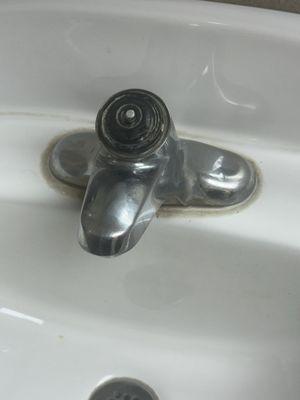 Filthy faucet hardly useable.