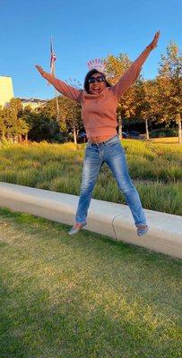 Jumping onto the grass at city hall