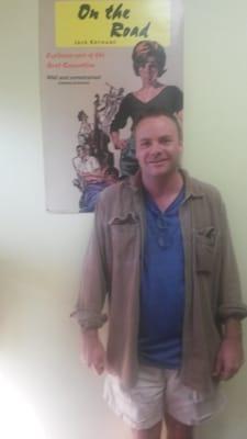 Howard in front of Jack Kerouac "On the Road" Poster