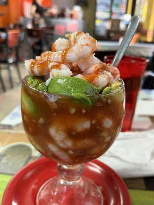 The large shrimp cocktail with avocado, cucumbers and special seasonings. It's delicious! It's about $20.00