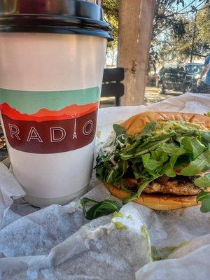 Breakfast sandwich on potato bun - no egg, sausage bacon tomato and avocado, arugula and aioli. SO GOOD!