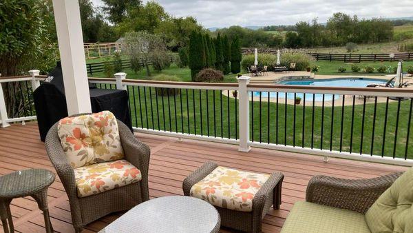 Elevated composite deck with outdoor furniture.