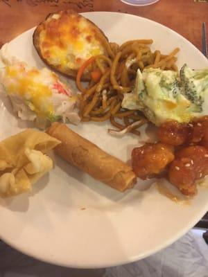 Several mayo-based dishes - crab/cheese casserole, potato wedges, and broccoli.