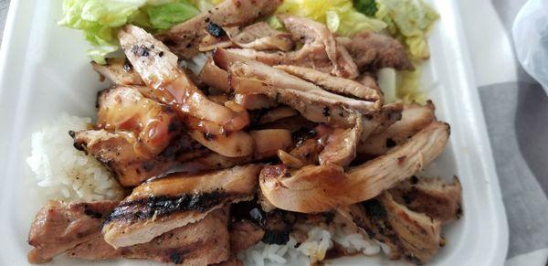 Terriyaki chicken over rice, and side of salad.