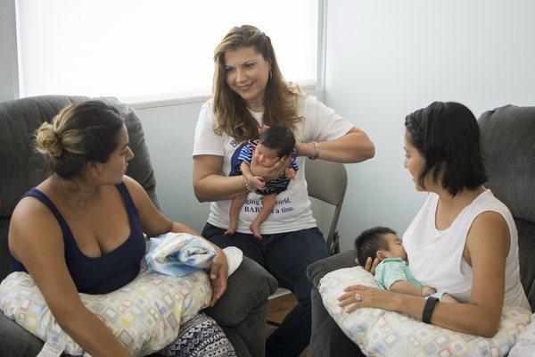 New mothers are invited to attend weekly breastfeeding and support groups to share with and support each other.