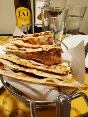 Naan, 2 flavors-regular or garlic. warm and fluffy, not too dry. perfect.