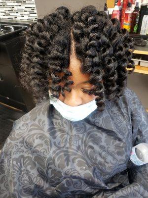 Rod set on natural hair.