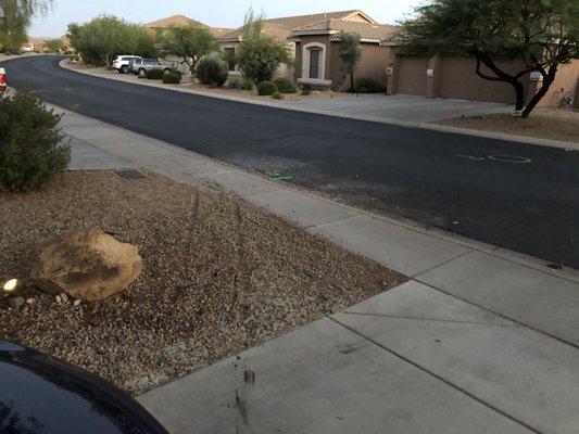 Tracks and gravel mess in the street