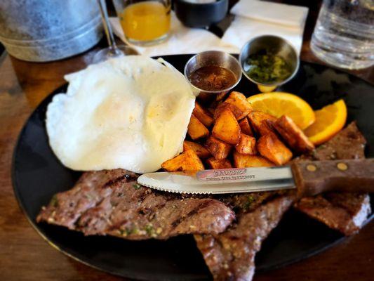 Skirt steak served with your style of eggs, roasted red potatoes, and a citrus twist