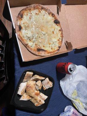 Four cheese pizza and garlic bread.