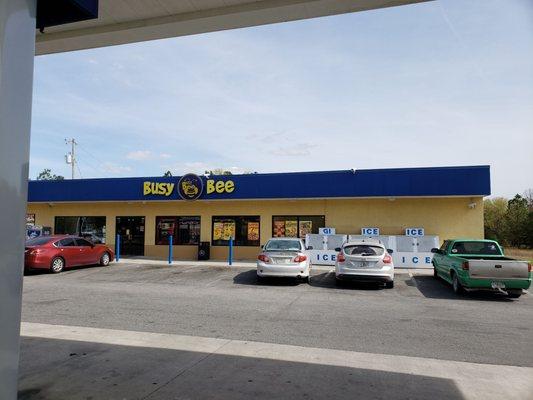 Bill Lewis of Vero Beach filling up for $2.55 a gallon at Busy Bee in Lake City, Florida.