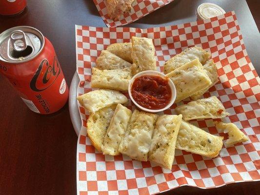 $3.99 lunch combo. Can of pop and an order of garlic bread and marinara.