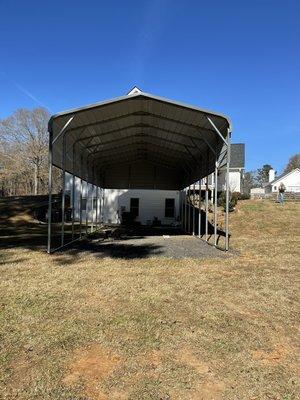 Metal carport covers wood storage sheds