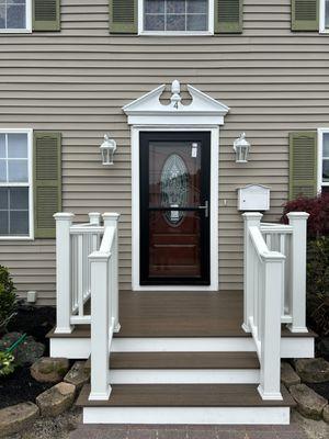 New porch, front door, storm door, walkway pavers