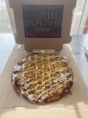 Cherry streusel dessert pizza