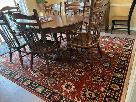 Karastan rug with dining room set.