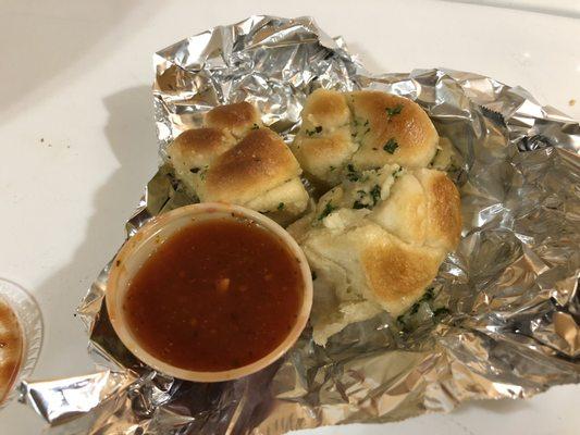 Garlic knots + dip. Advertised as 4, but brought 3, but aside from that, they're alright for an appetizer. Squishy too. (10/13/2018)