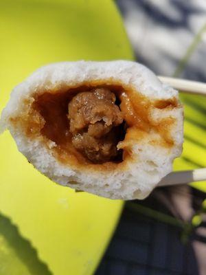 Inside the mini fried pork buns, 3x for $1.75.