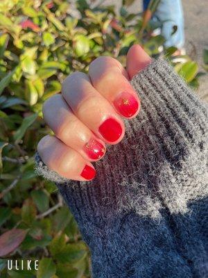 Nails done for New Years!!! Nice and red !! I did the ombré red gel for my nails with some moons and stars for decoration.