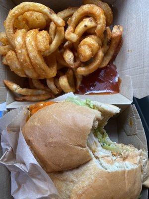 Buffalo chicken sandwich (couldn't wait to take a bite) & curly fries