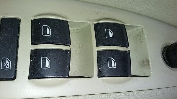 Driver's window switch plate. Not even wiped at all for $53.70