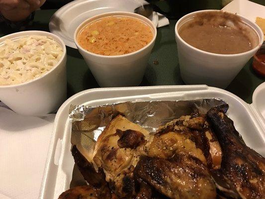 Whole chicken meal with macaroni, rice, and beans