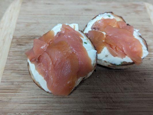 Onion bagel with chive cream cheese and smoked salmon.