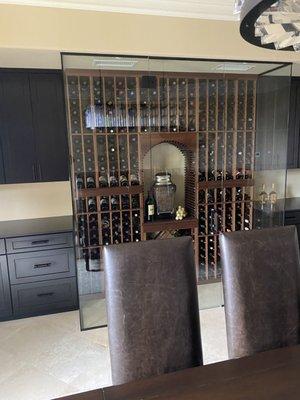 Wine cellar with whisper self contained air conditioning system.  Keeps bottled wine at 57 degrees.