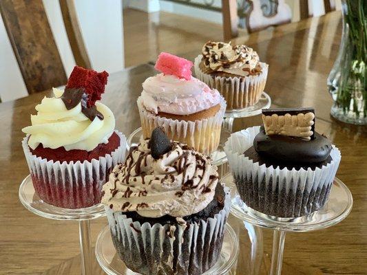 Mother's Day cupcakes! Coffee mocha, red velvet, strawberries and cream, dark chocolate fudge, and caramel Frappuccino!