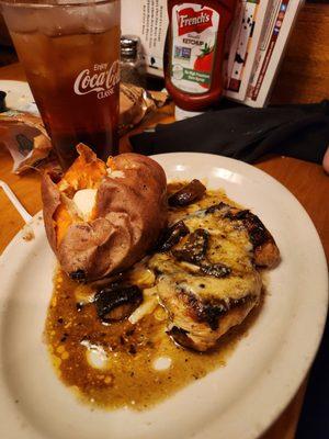 Fiancée's chicken is covered with a portobello mushroom sauce. Needed a lot more mushrooms.