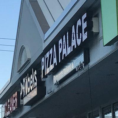 Pizza Palace next to cleaners