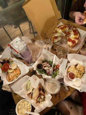 Salmon sandwich, clam chowder, fish tacos, shrimp quesadilla, ahi salmon, and pizza