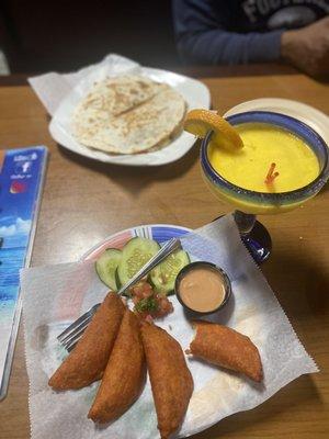 Shrimp quesadilla and shrimp empanadas with mango margarita