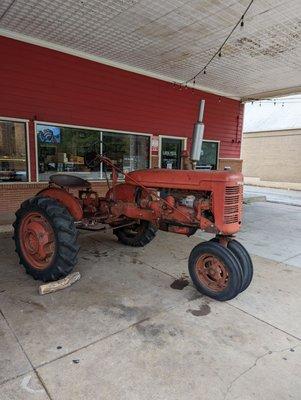 One of my earliest memories riding a tractor like this with my grandfather Smells exactly the same!