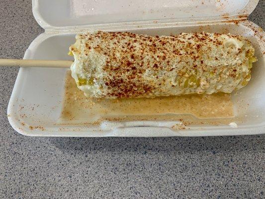 Elote: Corn covered with butter then mayonnaise, dipped in Parmesan cheese and finally sprinkled with chili pepper!!