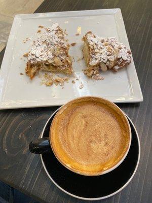 Nice and rich latte with an almond croissant