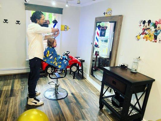 Kid's first haircut by Master G