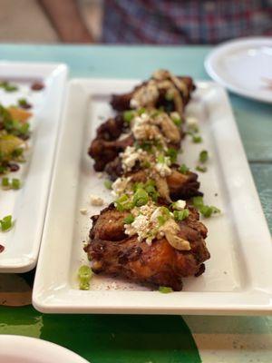 Jerk chicken wings with goat cheese