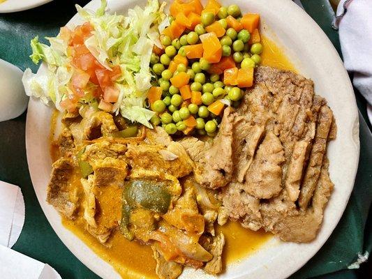 Steak Ranchero, vegetables, refried beans and salad