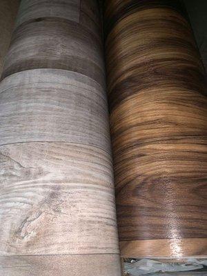 Vinyl, Light and dark wood style.  ONLY $.78 Cent per square foot!  *Loose lay, or glued down* *NEXT DAY INSTALLATION!!*