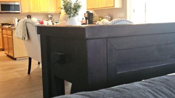 Power plug added to console table for charging