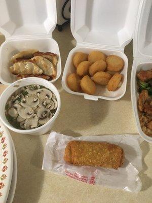 Fried Scallops, GyoZa, Clear Soup and an Egg Roll.