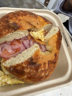 Egg, cheese, onion, tomato bagel