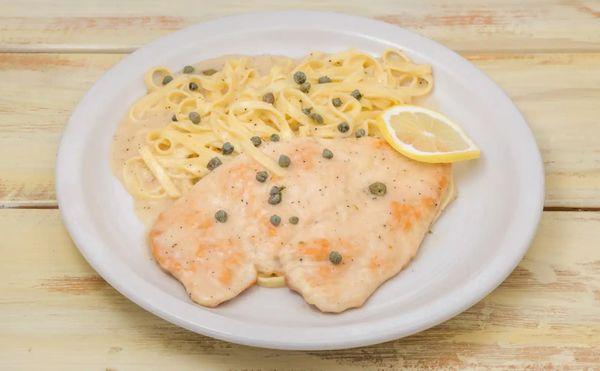 Chicken Piccata - Pan-Fried Chicken Breast Cutlets are Simmered in a Wine, Buttery Lemon Capers Sauce. Linguine Pasta